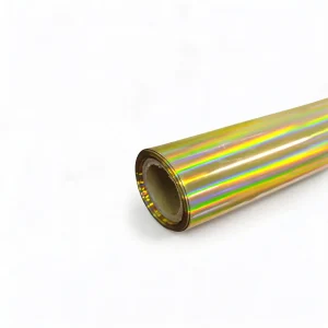 Close view of a gold holographic foil roll illustrating one decorative effect