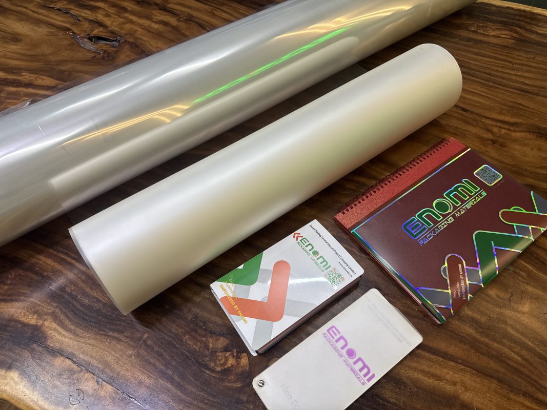 Clear and matt plastic film rolls and ENOMI material samples